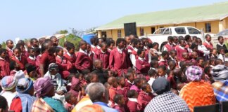 KHIWA’s MEDIA SPREAD THE SPIRIT OF UBUNTU BY GIVING OUT UNIFORM , SCHOOL SHOES & FOOD PARCELS.