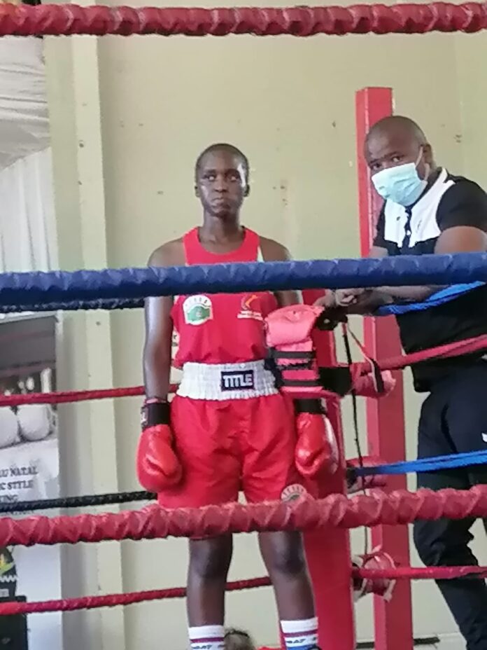 Young boxer raising the bar