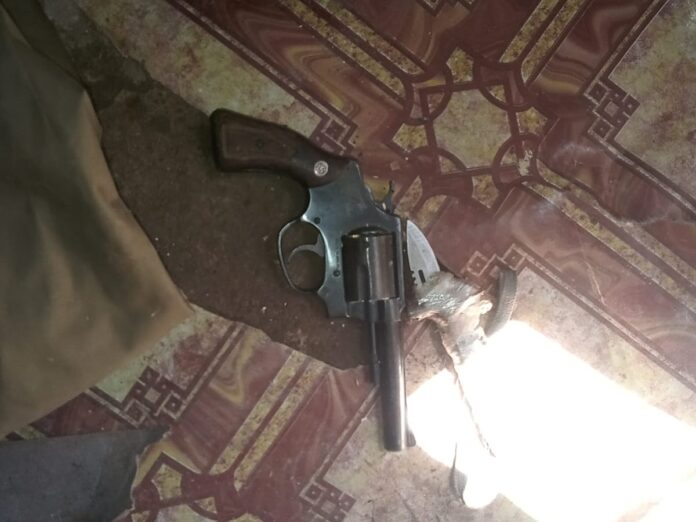 Police recovered three firearms ( a revolver and two hunting rifles), which were stashed in different areas inside the house.