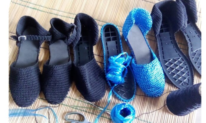 Self-taught knitting young lady designs beautiful shoes and clothes