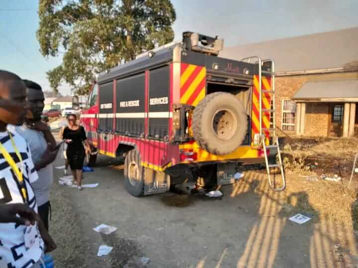 Chaos erupted as a raging fire swept through Holycross Hospital, leaving staff members homeless and destroyed a closed post office, sparking questions about the mysterious inferno’s origin in the velds.