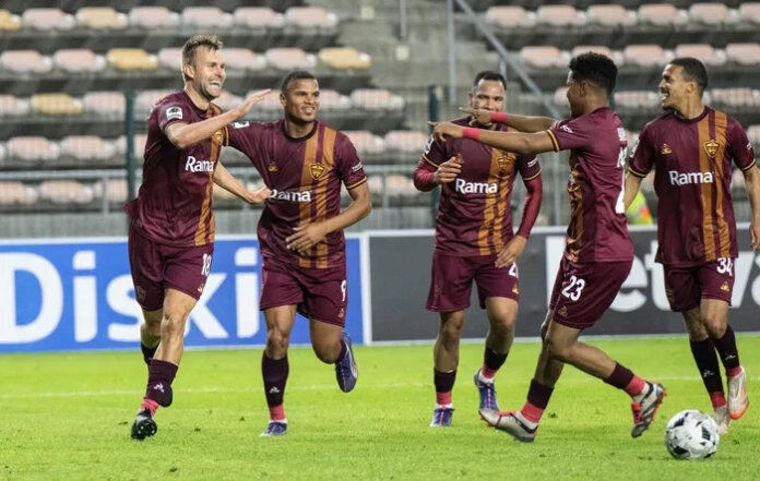 AmaZulu Stellenbosch FC players in maroon celebrating a goal ahead of their MTN8 clash with AmaZulu.