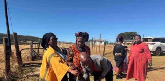 MEC Nonceba Kontsiwe is joined by the chairperson on the local spring water project, Mzuxolile Griffiths and Instika Yethu Municipality Mayor Khanyisa Mdleleni during the official handover of spring water project in Chamama Forest village