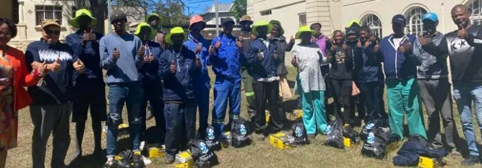 Waste Pickers From Kwa Nojoli Receiving Personal Protective Equipment (PPE) From Polyco PRO Waste pickers from Kwa Nojoli receiving Personal Protective Equipment (PPE) from Polyco PRO