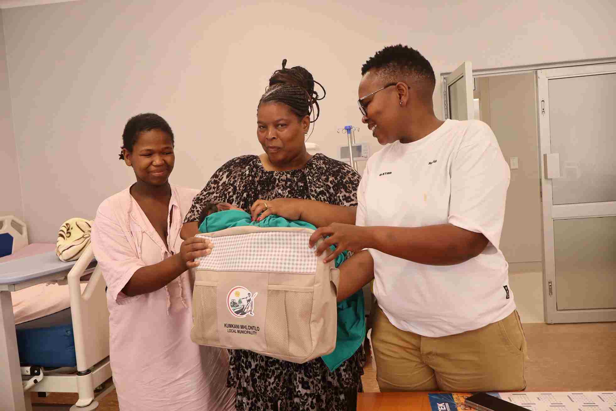 Christmas Babies Receive Gifts At Mthatha And Tsolo Hospitals (1) 11zon Councillor Socikwa handing gifts to new mothers during hospital visit