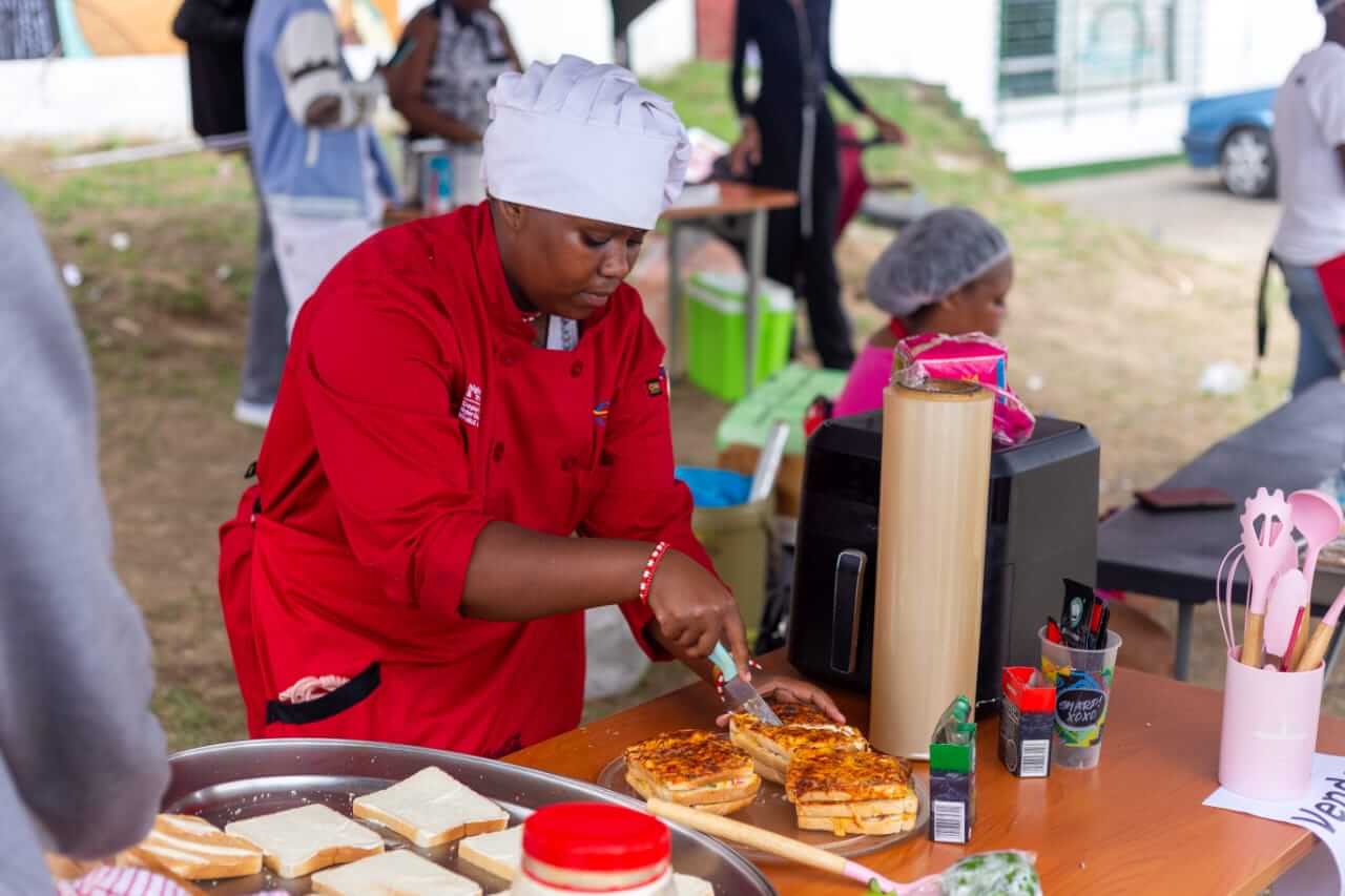 Mlibo Willie, One Of The Cooks , Preparing Her Meals Mlibo Willie, one of the cooks , preparing her meals